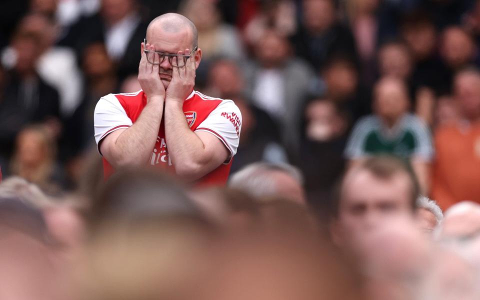 An Arsenal supporter shows his frustration during the Premier League draw with West Ham - How do Arsenal stop the choke? Trust the psychological beliefs of Mikel Arteta - Getty Images/Alex Pantling