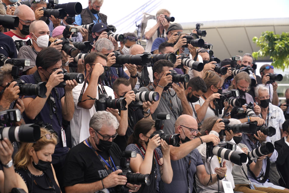 Photographers take pictures at the photo call for Jodie Foster. Foster will receive an honorary Palme d'Or during the opening ceremony of the 74th international film festival, Cannes, southern France, Tuesday, July 6, 2021. (AP Photo/Brynn Anderson)