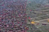 <p>Lurang Gar, once the world’s largest Buddhist settlement, is being demolished by authorities in China. (Marco Grassi) </p>