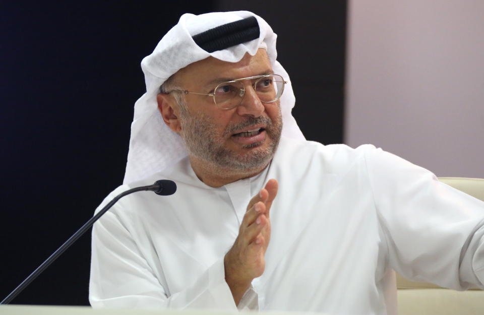 Emirati Minister of State for Foreign Affairs Anwar Gargash speaks during a news conference on Yemen in Dubai, United Arab Emirates, Monday, Aug. 13, 2018. The United Arab Emirates on Monday described itself as actively fighting al-Qaida's branch in Yemen after an Associated Press report outlined how Emirati forces cut secret deals with the militants to get them to abandon territory. (AP Photo/Jon Gambrell)