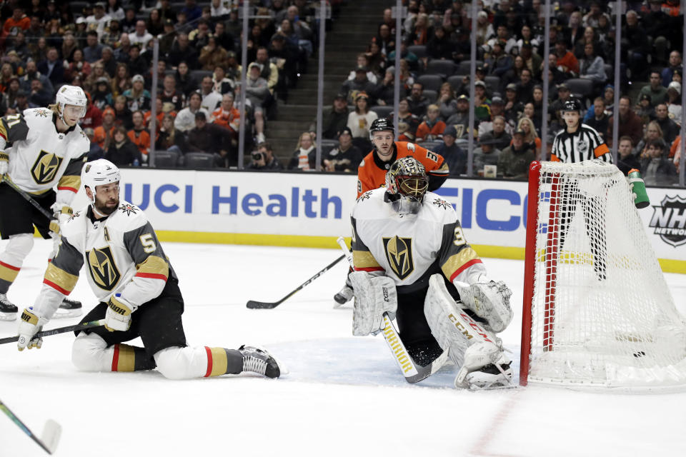 Vegas Golden Knights goaltender Malcolm Subban, right, gives up a goal on a shot from Anaheim Ducks' Adam Henrique, not seen, during the second period of an NHL hockey game Friday, Dec. 27, 2019, in Anaheim, Calif. (AP Photo/Marcio Jose Sanchez)