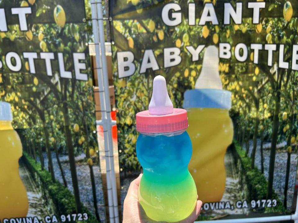 Giant Baby Bottle puts a fun twist on how they serve their sweet lemonade-- serving it in plastic, over-sized baby bottles. Patrons at the California State Fair can purchase a baby bottle of lemonade and earn one free refill. Hannah Shields/hshields@sacbee.com