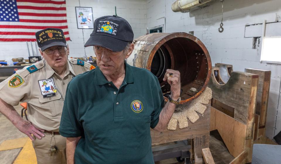 Richard Griffith, one of the volunteers and tour guides for the Nike missile base museum at Sandy Hook's Fort Hancock, talks about restoring an old missile as Bill Jackson looks on. They are part of a group of Army veterans running a recently opened museum dedicated to the Nike missile program and restoring a Nike Ajax missile for it. All the veterans worked on the restoration of the area as volunteers.