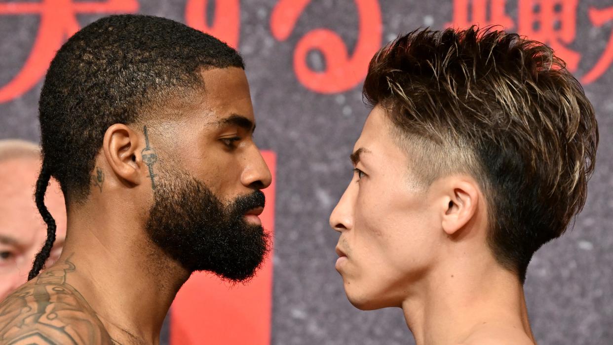  WBC and WBO super bantamweight champion Stephen Fulton (L) of the US and Japanese challenger Naoya Inoue face off during the official weigh-in at a hotel in Yokohama, Kanagawa prefecture on July 24, 2023, ahead of their title match at Tokyo's Ariake Arena on July 25 