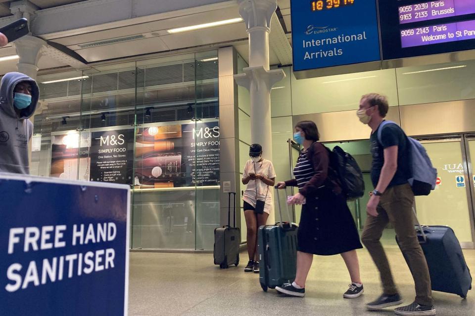 Travellers arriving off the Eurostar at St Pancras in London (PA)