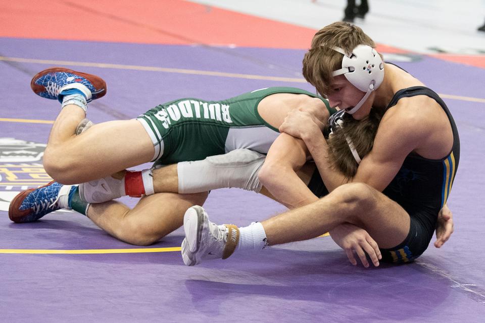 Maysville’s Colton Smitley competed in a 126 pound match on Day 2 of the 85th annual OHSAA state wrestling tournament at Schottenstein Center in March. Smitley signed his letter of intent to be a preferred walk-on with West Virginia University.