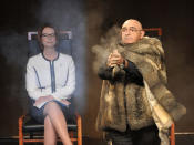 <p>An Aboriginal elder performs a welcome as Prime Minister Julia Gillard looks on, during a ceremony on the forced adoptions apology.</p>