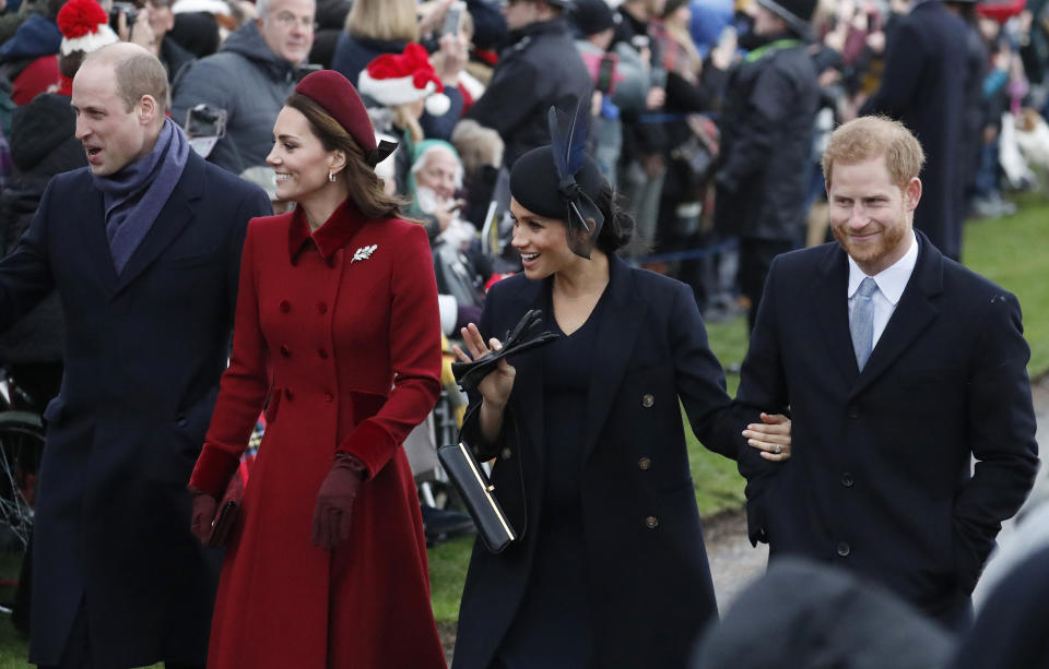 FILE - In this Tuesday, Dec. 25, 2018 file photo, with from left, Britain's Prince William, Kate Duchess of Cambridge, Meghan Duchess of Sussex and Prince Harry, arrive to attend the Christmas day service at St Mary Magdalene Church in Sandringham, England. Prince Harry will attend the funeral for Prince Philip on Saturday April 17, the first time that Harry will come face to face with the royal family since he and his wife Meghan, the Duchess of Sussex, stepped away from royal duties last March and moved to California.(AP Photo/Frank Augstein, file)