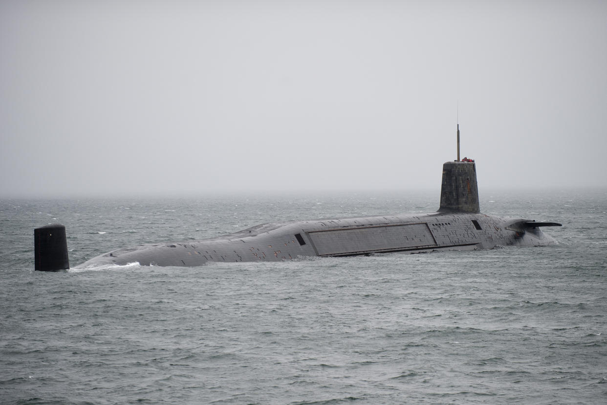 LARGS, SCOTLAND - FEBRUARY 27:  In this handout image provided by MoD Crown Copyright, HMS Vengeance departs for Devonport prior to re-fit on Ferbruary 27, 2012 off the coast of Largs, Scotland. The UK Ministry of Defence has awarded UK's leading naval support business Babcock, on March 25, 2012, with a contract to commence the planning phase for the £350 million GBP refit of Trident ballistic missile submarine HMS Vengeance, which will be undertaken at their Devonport Royal Dockyard. The project to upgrade and refuel the nuclear submarine will safeguard 2,000 UK jobs and will take around three and a half years. River Tamar shipping was suspended when the the 150m-long, 15,900-tonne submarine HMS Vengeance travelled to the Devonport Dockyard ahead of the scheduled refit on March 2, 2012, arriving amid concerns without a signed contract for the refit.  HMS Vengeance will be the last of four Vanguard class submarines to undergo a Lond Overhaul Period and Refuel LOP(R) at Davernport that will commence once HMS Vigilant leaves Devonport on completion of her LOP(R) in 2012. Mandatory Credit: (Photo by Andrew Linnett/MoD Crown Copyright via Getty Images)