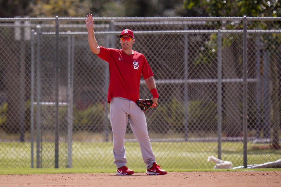 St. Louis Cardinals infielder Paul Goldschmidt waves from his position during spring training baseball practice Monday, Feb. 22, 2021, in Jupiter, Fla. (AP Photo/Jeff Roberson)