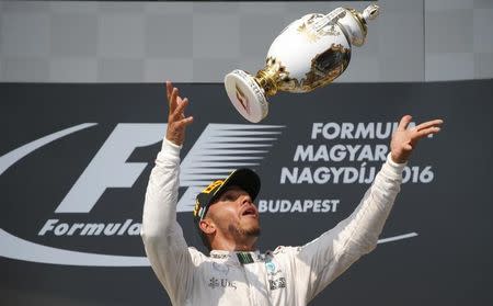 Hungary Formula One - F1 - Hungarian Grand Prix 2016 - Hungaroring, Hungary - 24/7/16 Mercedes' Lewis Hamilton celebrates after winning the race REUTERS/Laszlo Balogh