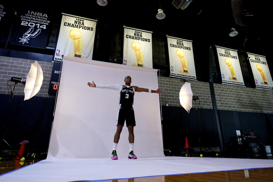 San Antonio Spurs forward Keldon Johnson (3) poses for photos during the team's NBA basketball Media Day, Monday, Sept. 26, 2022, in San Antonio. (AP Photo/Eric Gay)