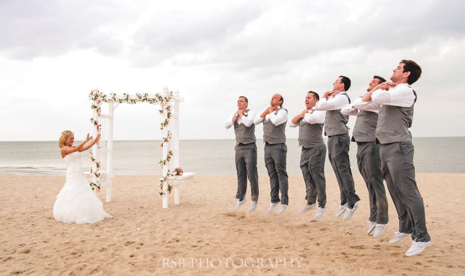 <div class="caption-credit"> Photo by: RSB Photography</div><div class="caption-title">Movie-Inspired</div>Here, the bride channeled Darth Vader and used the "Force Choke" to lift the groom and groomsmen off the ground. <a rel="nofollow noopener" href="http://www.bridalguide.com/planning/engagement/star-wars-themed-engagement-photos" target="_blank" data-ylk="slk:Related: Star Wars-Themed Engagement Photos;elm:context_link;itc:0;sec:content-canvas" class="link "><b>Related: Star Wars-Themed Engagement Photos</b></a>