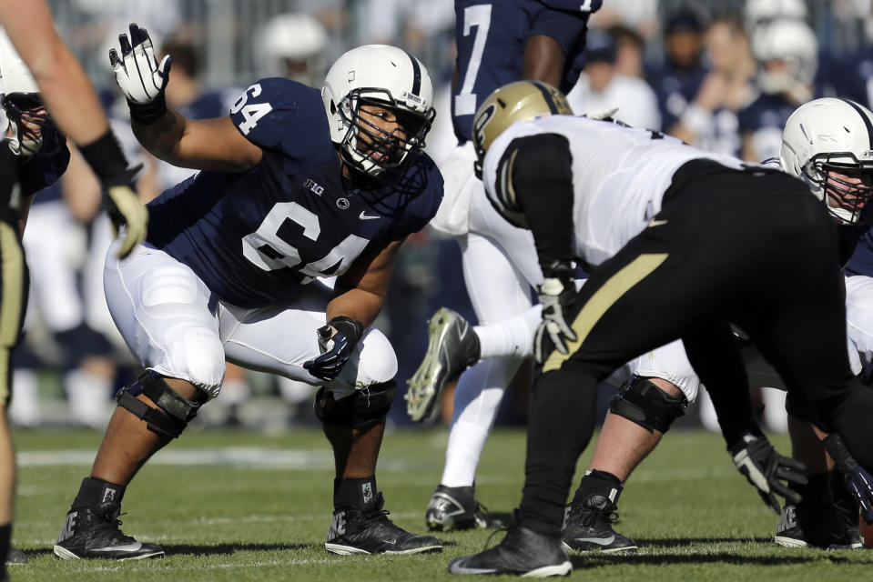 FILE - In this Nov. 16, 2013, file photo, Penn State guard John Urschel (64) lines up during the first quarter of an NCAA college football game against Purdue in State College, Pa. Urschel will routinely provide a look at his journey leading to the NFL draft on May 8, 2014, in a series of diary entries. (AP Photo/Gene J Puskar, File)