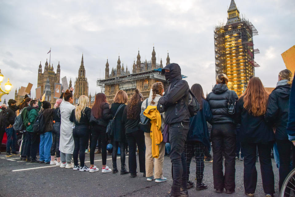 Protesters form a line along Westminster Bridge during Monday's demonstration.