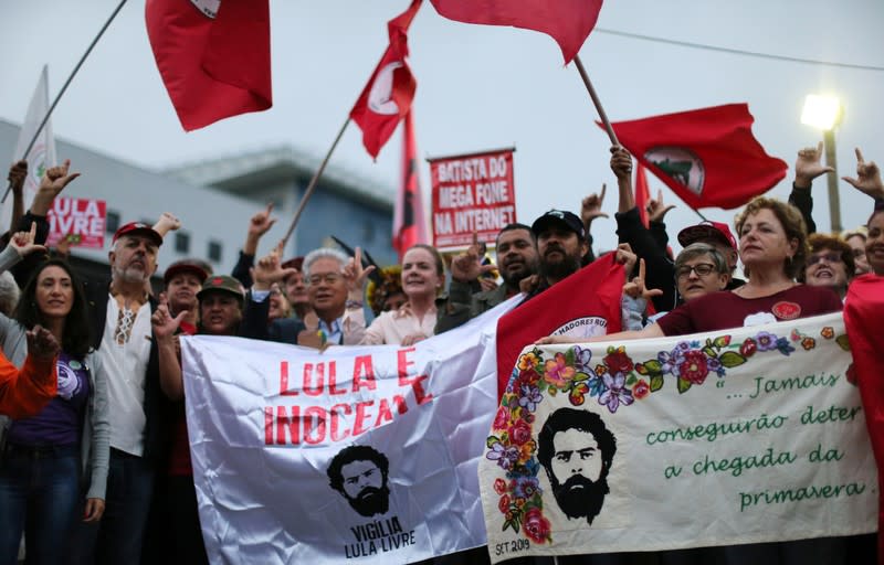 Supporters of Brazil's former president Luiz Inacio Lula da Silva gather outside the Federal Police headquarters where Lula is serving a prison sentence, in Curitiba