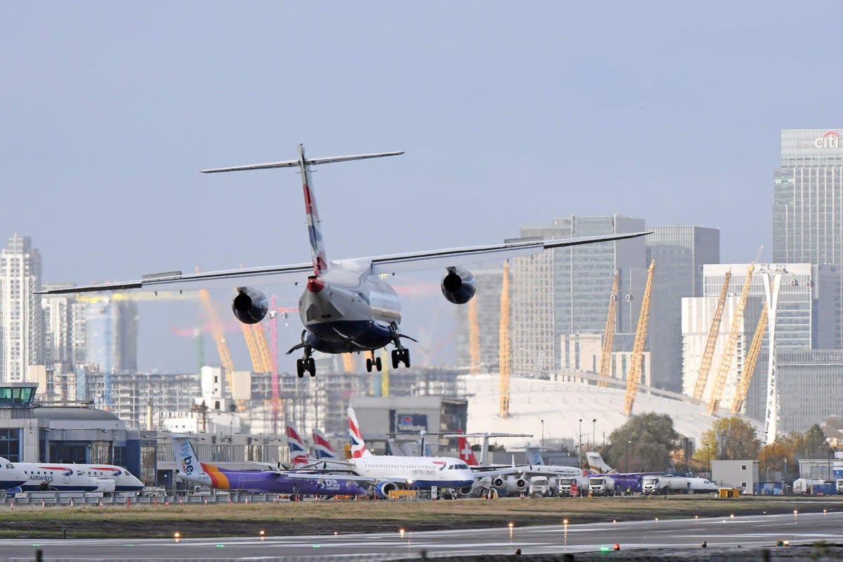 A plane landing at London City Airport (PA Archive)