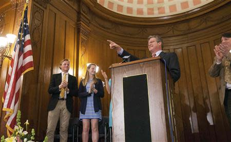 Ted Kennedy Jr. (2nd R), the son of the late Democratic Massachusetts Senator Edward M. Kennedy, gestures as he declares his candidacy for a seat in the Connecticut Senate, as his son Edward (L) and daughter Kiley applaud, in Branford, Connecticut April 8, 2014. REUTERS/Michelle McLoughlin