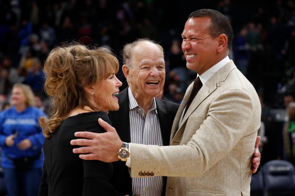 Glen Taylor, majority owner of the Minnesota Timberwolves, and his wife Becky Mulvihill greet minority owner Alex Rodriguez (right) after the team defeated the Golden State Warriors on Feb. 1, 2023.