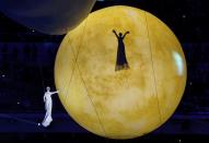 Performers take part in the closing ceremony for the 2014 Sochi Winter Olympics, February 23, 2014. REUTERS/Gary Hershorn (RUSSIA - Tags: OLYMPICS SPORT)
