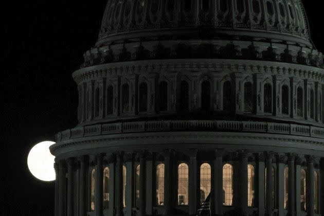 WASHINGTON, DC - OCTOBER 09: The Hunter’s Moon rises behind the dome of the U.S. Capitol on October 9, 2022 in Washington, DC. The Hunter’s Moon historically signaled the time for hunting with brighter moon light in preparation for the upcoming cold winter. (Photo by Alex Wong/Getty Images) (Photo: Alex Wong via Getty Images)