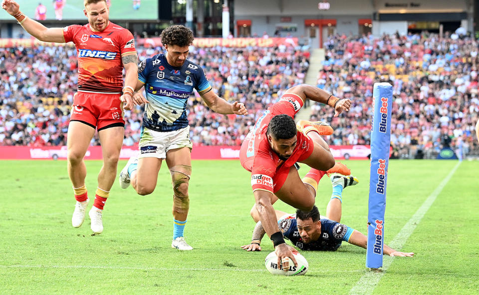 Robert Jennings, pictured here scoring two tries as the Dolphins came back to beat the Titans.