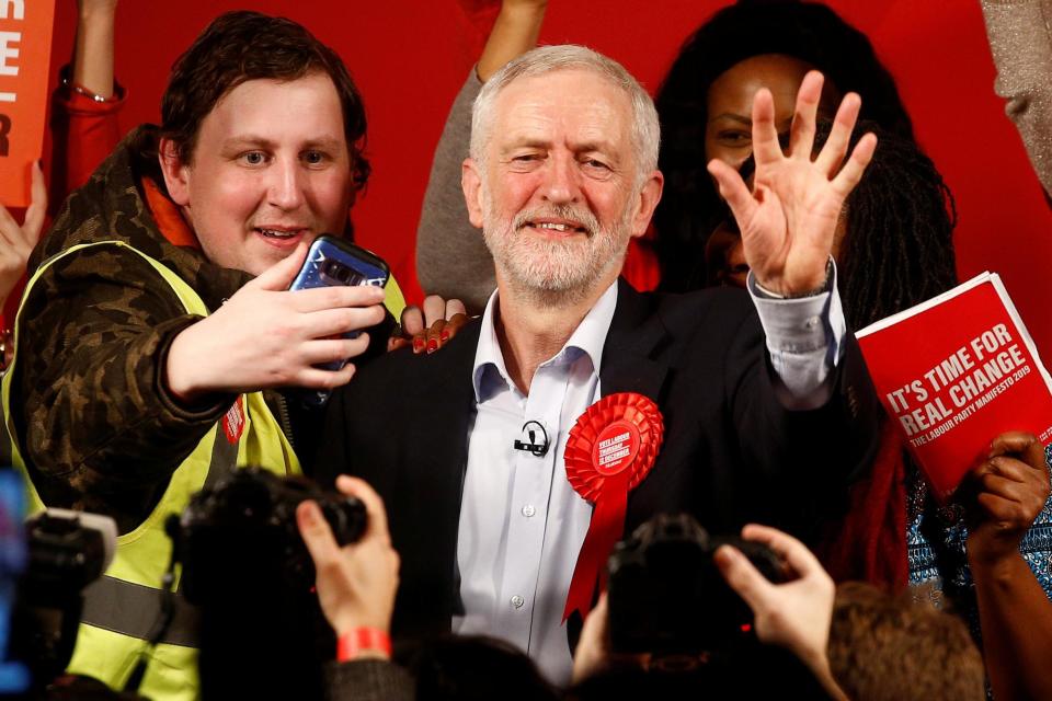 Jeremy Corbyn waves during a final general election campaign event in London (REUTERS)