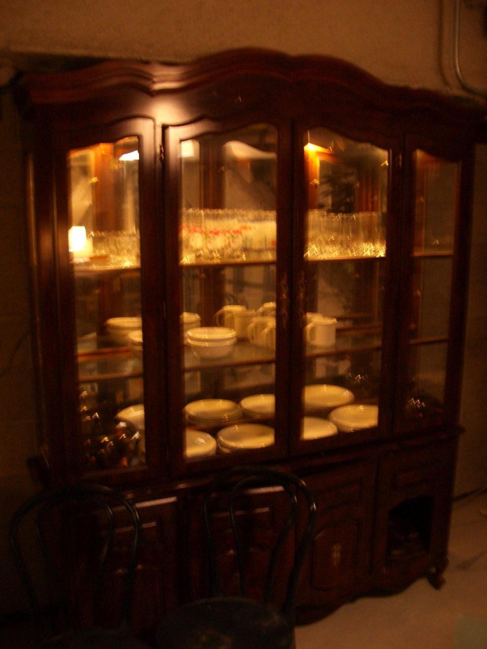 Among the furnishings smuggled into the secret apartment at Providence Place was this hutch, complete with china.