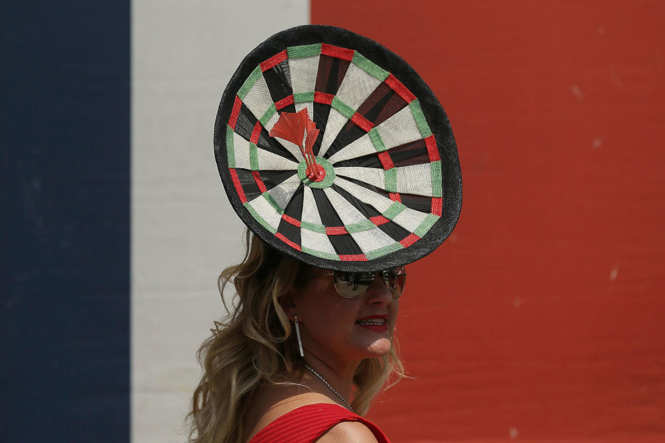 <p>A racegoer poses for photographers on the second day of the Royal Ascot horse race meeting in Ascot, England, Wednesday, June 21, 2017. (AP Photo/Tim Ireland) </p>