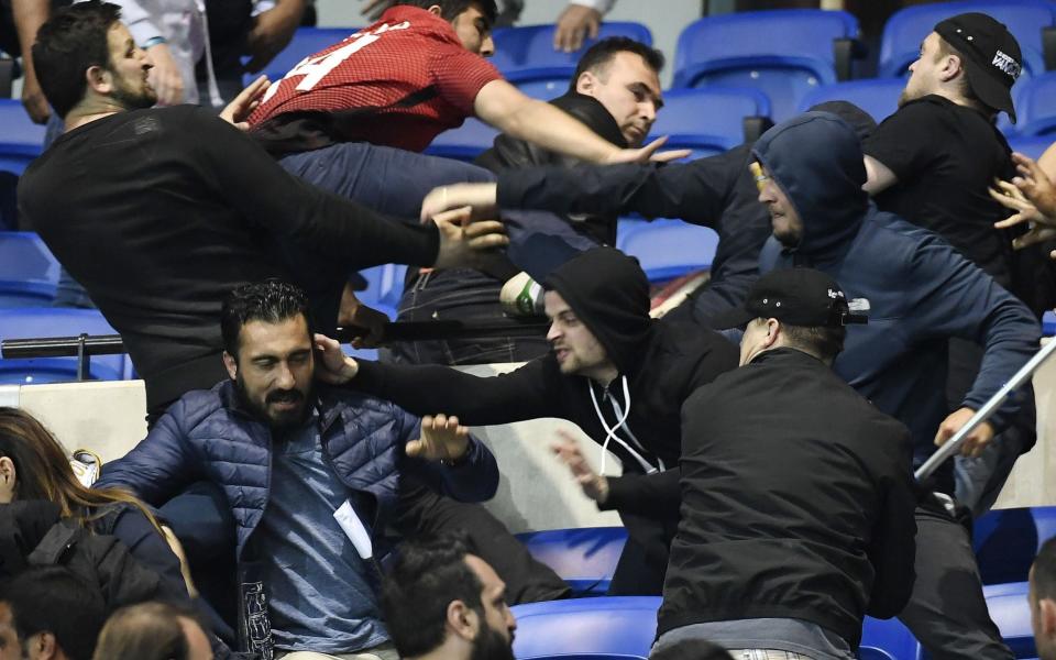 Disgraceful scenes in Lyon as shocking fan violence delays Europa League clash against Besiktas