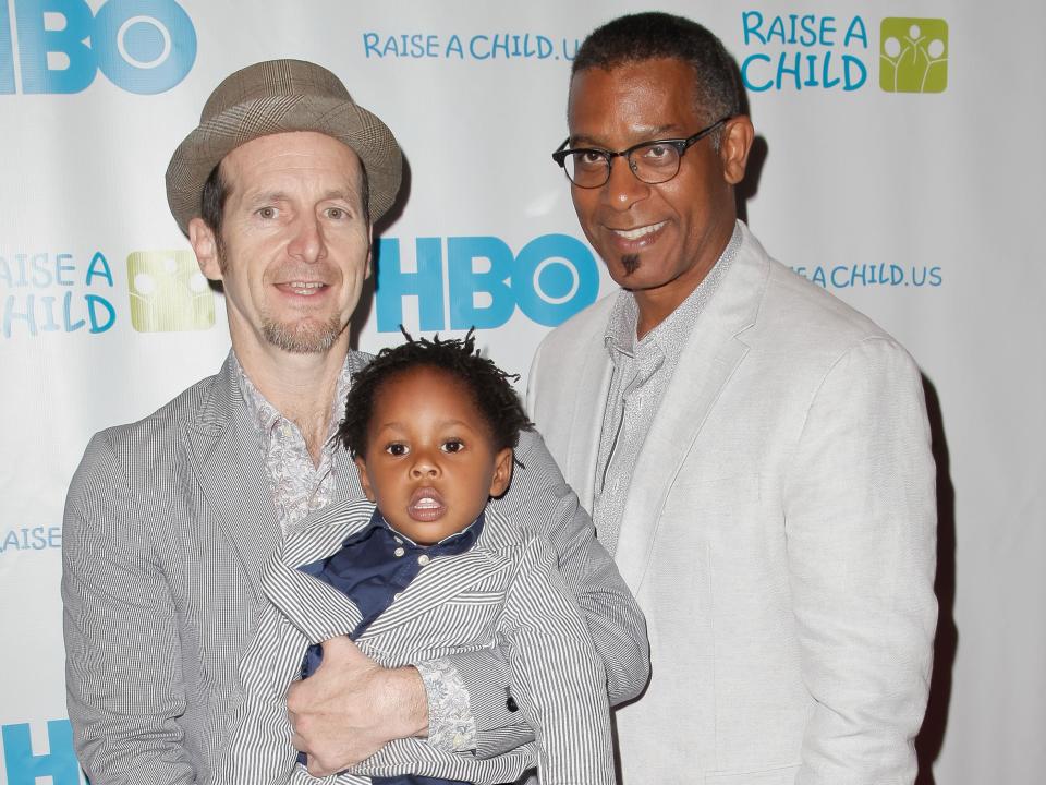 denis o'hare with his husband and baby