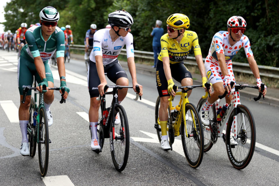 Jasper Philipsen, Tadej Pogacar, Jonas Vingegaard, and Giulio Ciccone show off their jerseys