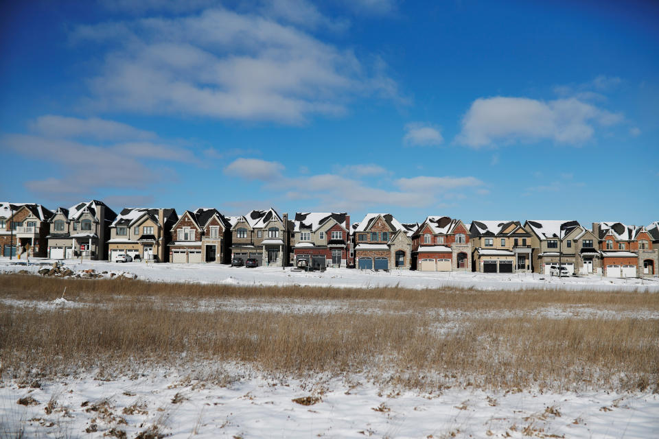 A row of houses stand in a subdivision in East Gwillimbury, Ontario, Canada (REUTERS)