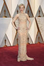 <p>Nicole Kidman has light skin so wearing pale colors is hard, but the actress made it work with a stunning nude gown designed just for her by Armani Privé. <em>(Photo: Getty Images)</em> </p>