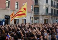 People gather for a protest in Barcelona