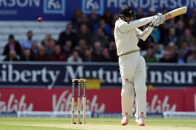 New Zealand's Matt Henry is caught out by England's Jos Buttler on the second day of the second test on May 30, 2015