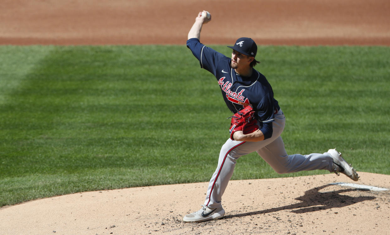 Atlanta Braves starting pitcher Kyle Wright throws agains the New York Mets during the second inning of a baseball game, Sunday, Sept. 20, 2020, in New York. (AP Photo/Noah K. Murray)