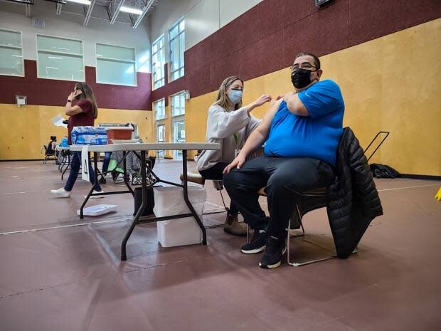 Wayne Sparrow, Chief of Musqueam Indian Band, receives his COVID-19 vaccine on March 2. (Chantelle Bellrichard/CBC News - image credit)