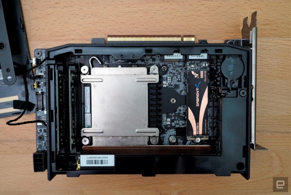 <p>Intel NUC 12 Extreme Compute Card opened, showing the CPU block, RAM slots and SSD.</p>

