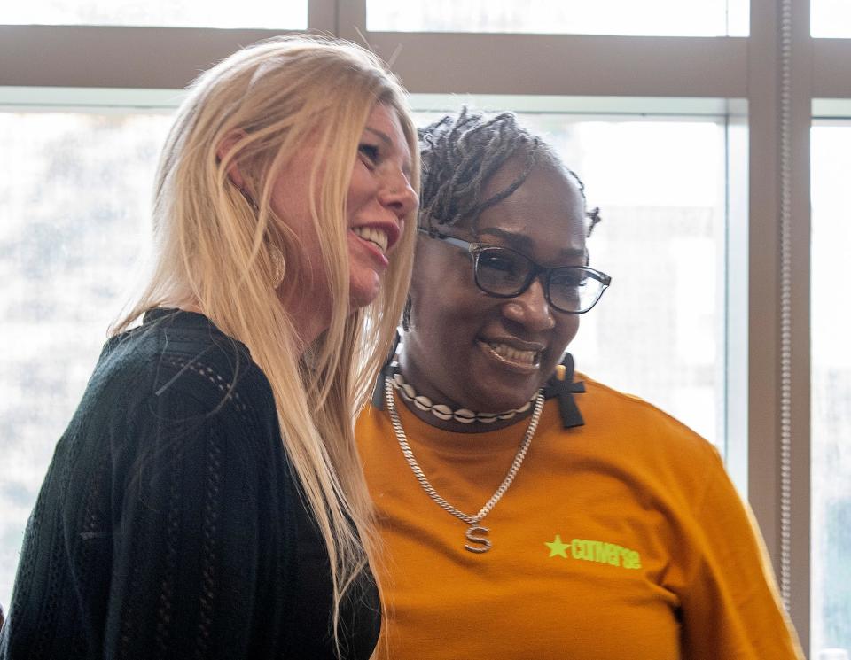 Rebecca Zwicker, left, and Sonia Thomas embrace after Thomas spoke at a press conference Tuesday. Zwicker is the founder of Community Program for Addiction Recovery and Thomas is a recovery coach with the program.