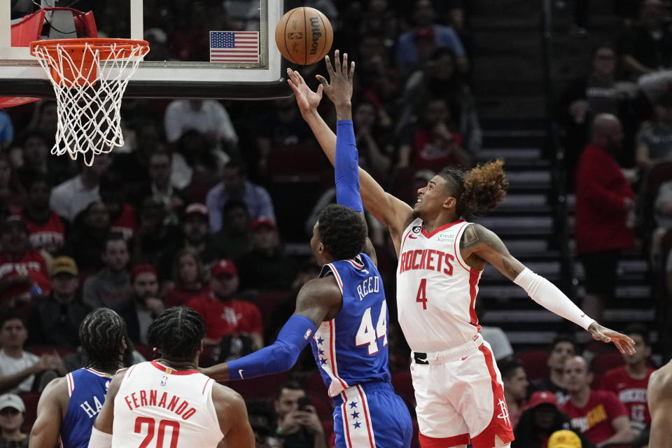 Houston Rockets guard Jalen Green (4) shoots as Philadelphia 76ers forward Paul Reed (44) defends during the first half of an NBA basketball game, Monday, Dec. 5, 2022, in Houston. (AP Photo/Eric Christian Smith)