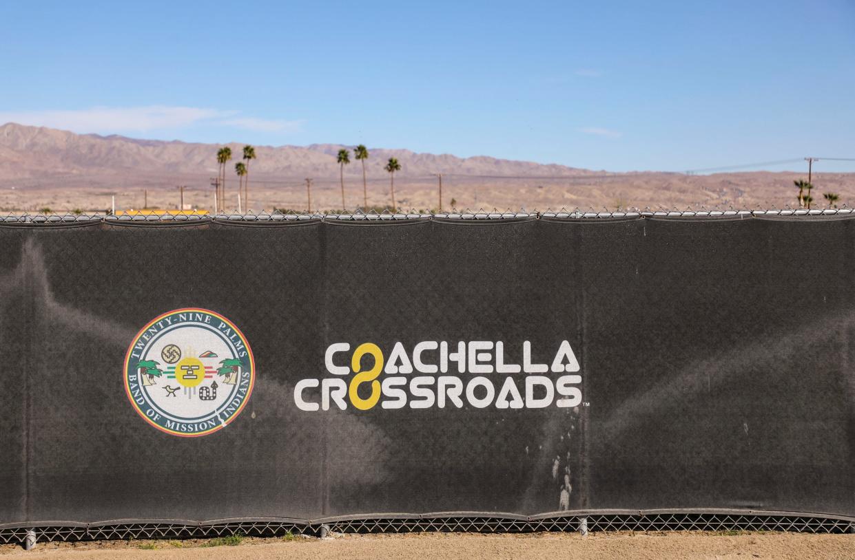 A fence surrounding the Coachella Crossroads is seen with a logo on it at Spotlight 29 Casino in Coachella, Calif., Friday, Feb. 18, 2022.