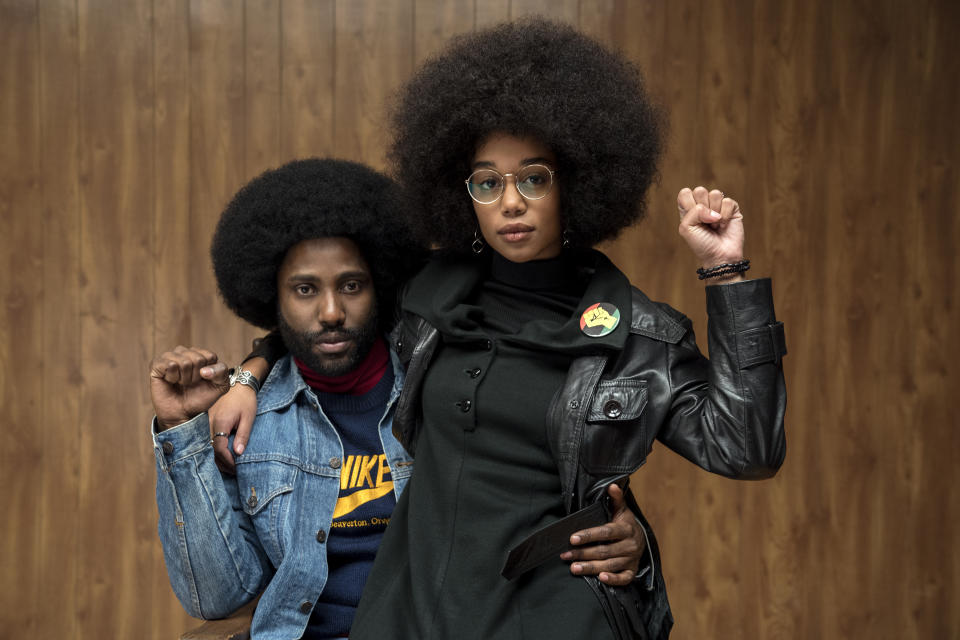 John David Washington, left, and Laura Harrier in a scene from “BlacKkKlansman.” (David Lee/Focus Features via AP)