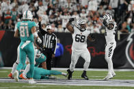 Cincinnati Bengals' Josh Tupou (68) reacts after sacking Miami Dolphins quarterback Tua Tagovailoa during the first half of an NFL football game, Thursday, Sept. 29, 2022, in Cincinnati. (AP Photo/Jeff Dean)