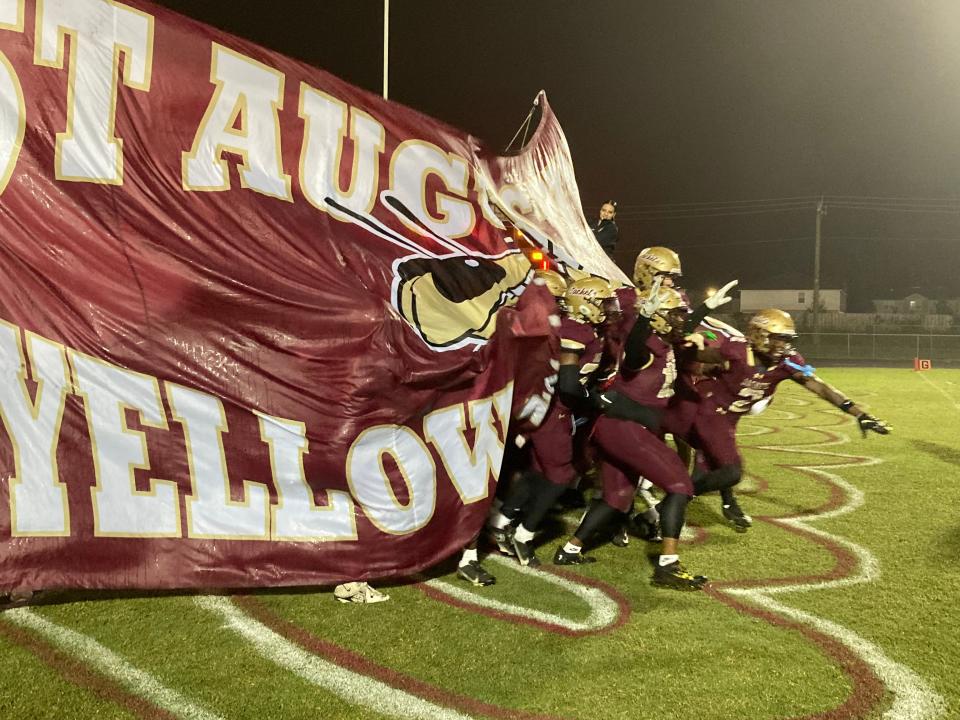 St. Augustine players rush onto the field for an FHSAA Region 1-3S high school football playoff against Escambia on November 17, 2023. [Ward Clayton/For the St. Augustine Record]