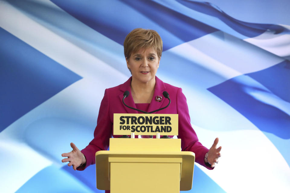 Scottish National Party (SNP) leader Nicola Sturgeon speaks at the launch of the party's General Election campaign backdropped by the Scottish saltire flag, in Edinburgh, Scotland, Friday Nov. 8, 2019. The Scottish National Party is officially launching its campaign for Britain’s upcoming Dec. 12 election, with the SNP hoping to put Scotland a step closer to independence. (Andrew Milligan/PA via AP)