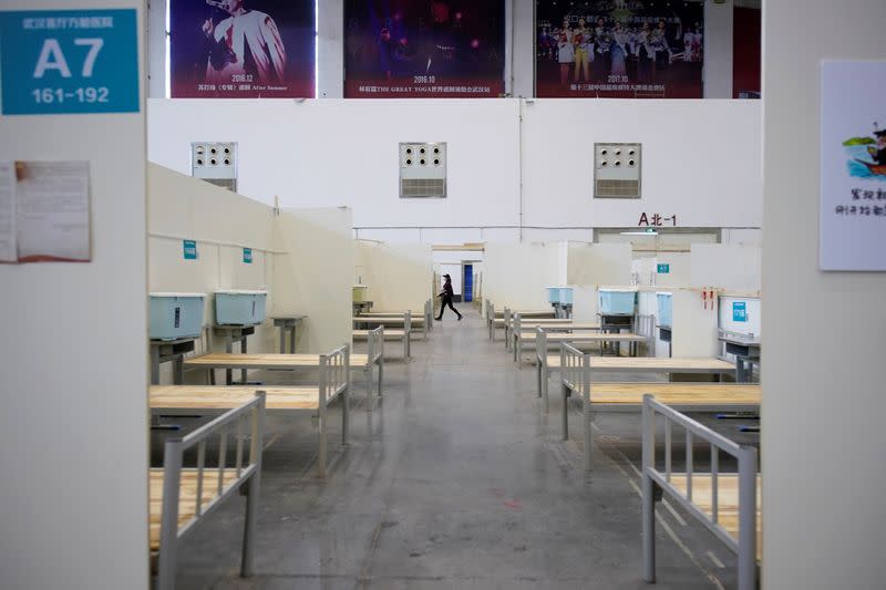 Bed frames are seen inside a convention center that was used as a makeshift hospital in Wuhan