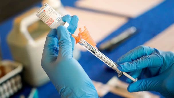 PHOTO: A nurse prepares a syringe of a COVID-19 vaccine at an inoculation station in Jackson, Miss., July 19, 2022. (Rogelio V. Solis/AP, FILE)