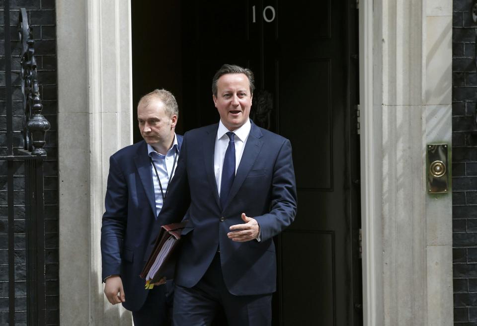 Britain's Prime Minister David Cameron leaves Number 10 Downing Street to attend Prime Minister's Questions at parliament in London, Britain July 8, 2015. REUTERS/Peter Nicholls