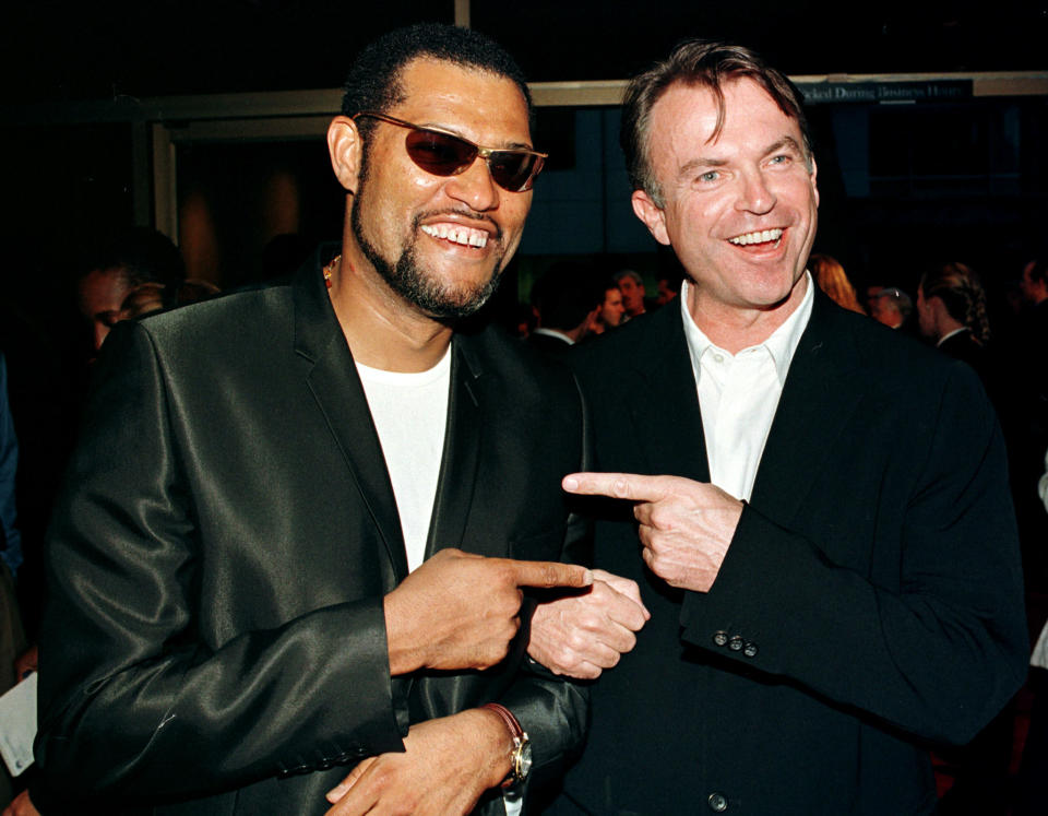 Actors Laurence Fishburne (L) and Sam Neill pose together at the premiere of their new film "Event Horizon" August 12 in Beverly Hills. The science fiction film is about a rescue mission in the year 2047 sent to the outer reaches of the solar system to salvage a prototype spaceship missing for seven years. The film opens in the United States August 15.